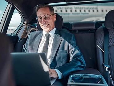 Luxury airport transfer for business traveler | Top Class Chauffeurs, limo service, business travel, JFK, Newark, LaGuardia