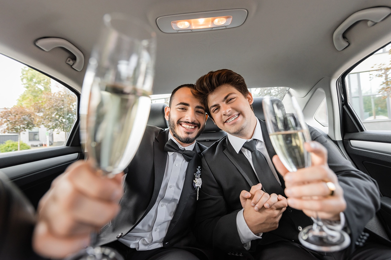 Happy couple celebrating prom night | Top Class Chauffeurs, luxury prom limo, elegant transportation